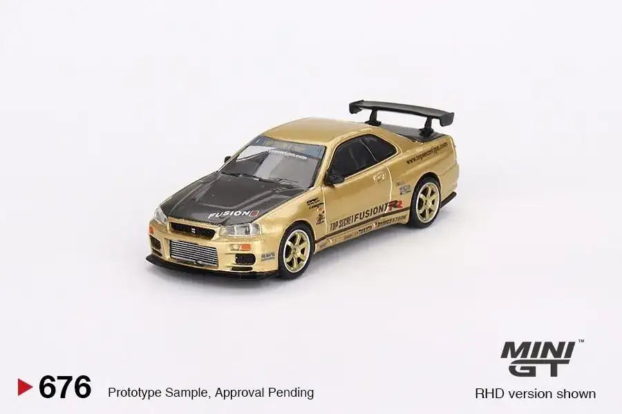Mini GT Mini GT #676 Japan Exclusive - Nissan Skyline GT-R (R34) Top Secret Gold