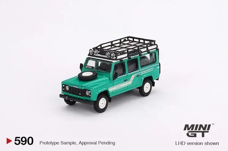 Mini GT Mini GT #590 Land Rover Defender 110 1985 County Station Wagon Trident Green