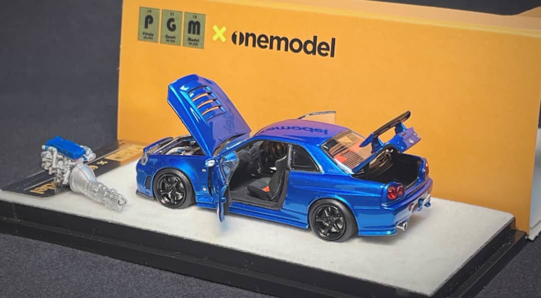 PGM X One Model 1:64 Scale Nissan Skyline GTR R34 Nismo Z Tune Metallic Blue