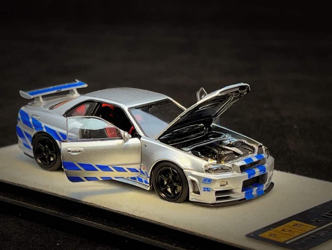 PGM X One Model 1:64 Scale Nissan Skyline GTR R34 Nismo Z Tune Blue Stripe