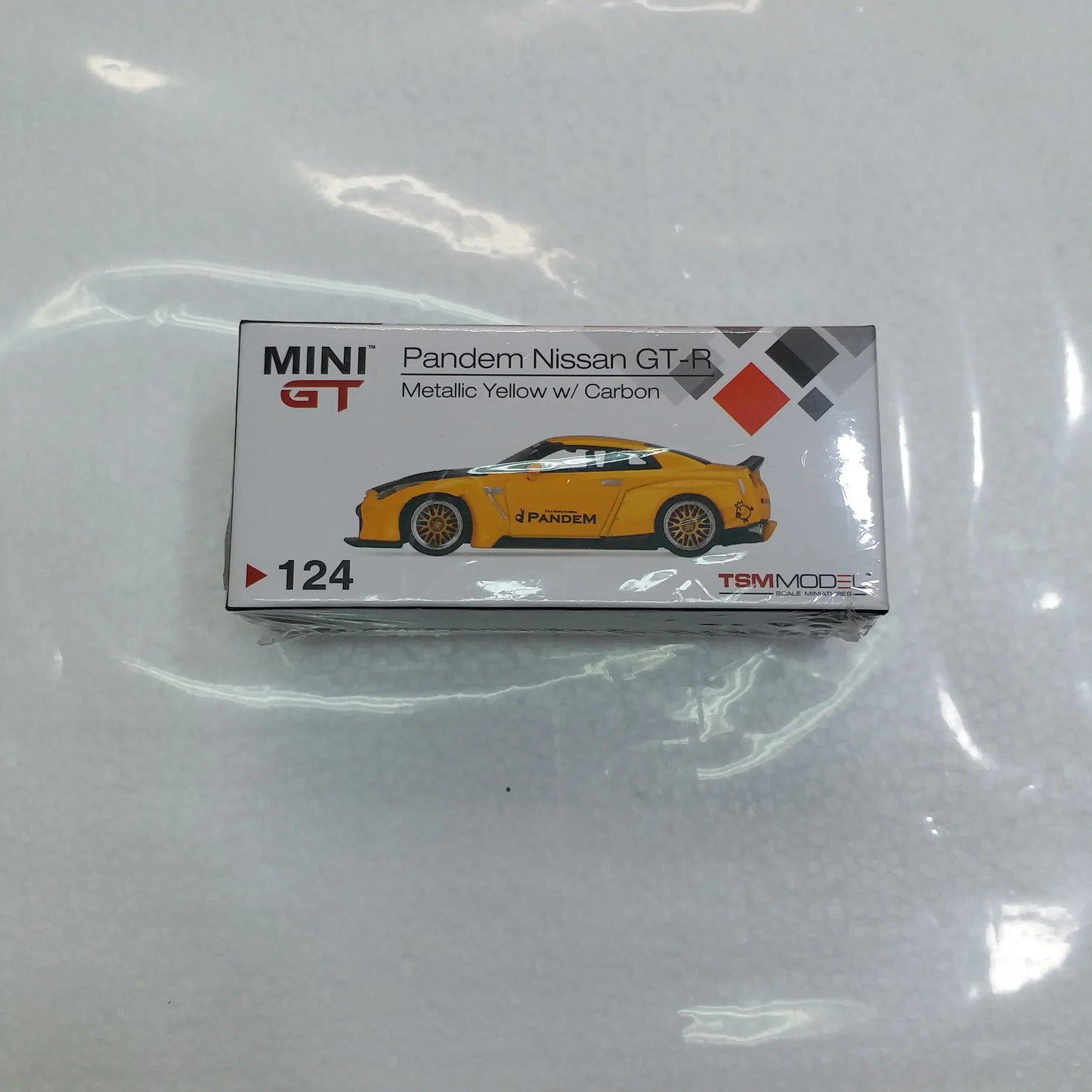 Mini GT Mini GT #124 Pandem Nissan GT-R (R35) Duck Tail Metallic Yellow w/ Carbon