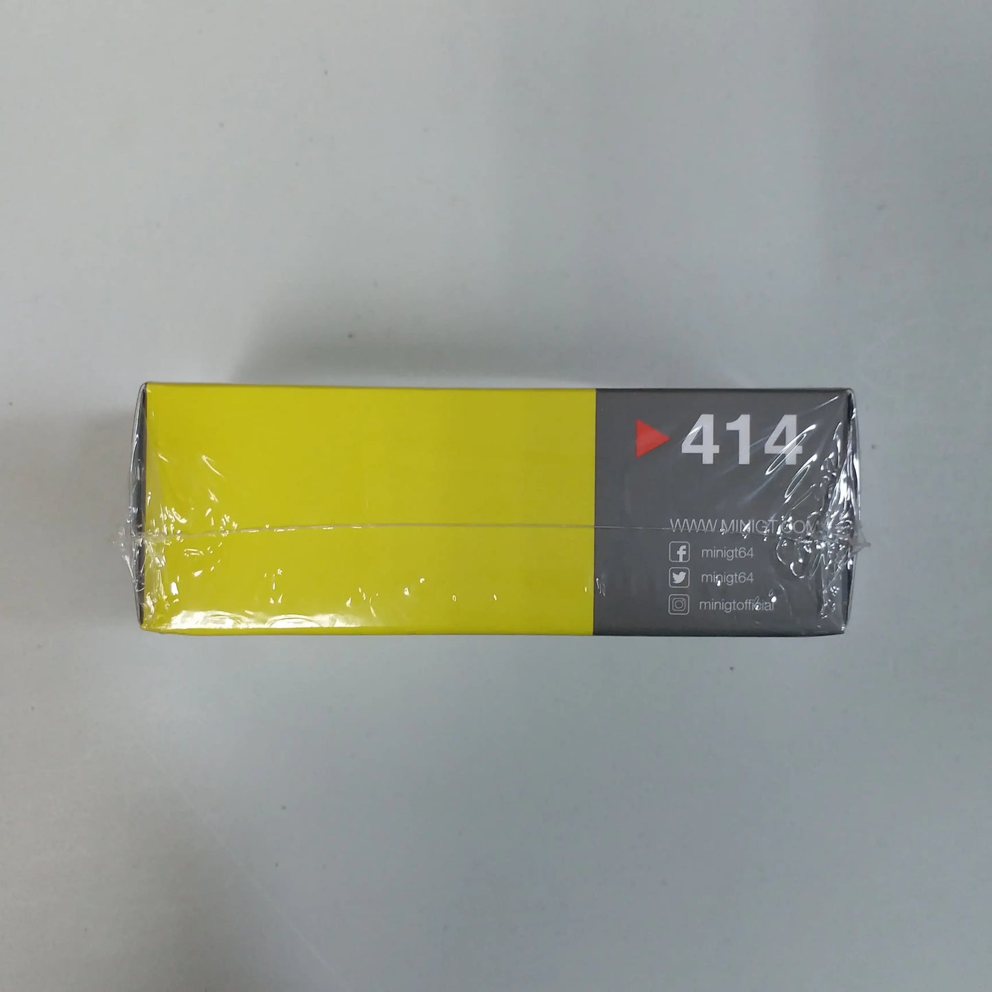 Mini GT Mini GT #414 Nissan Fairlady Proto Spec Ikazuchi Yellow 1:64 scale