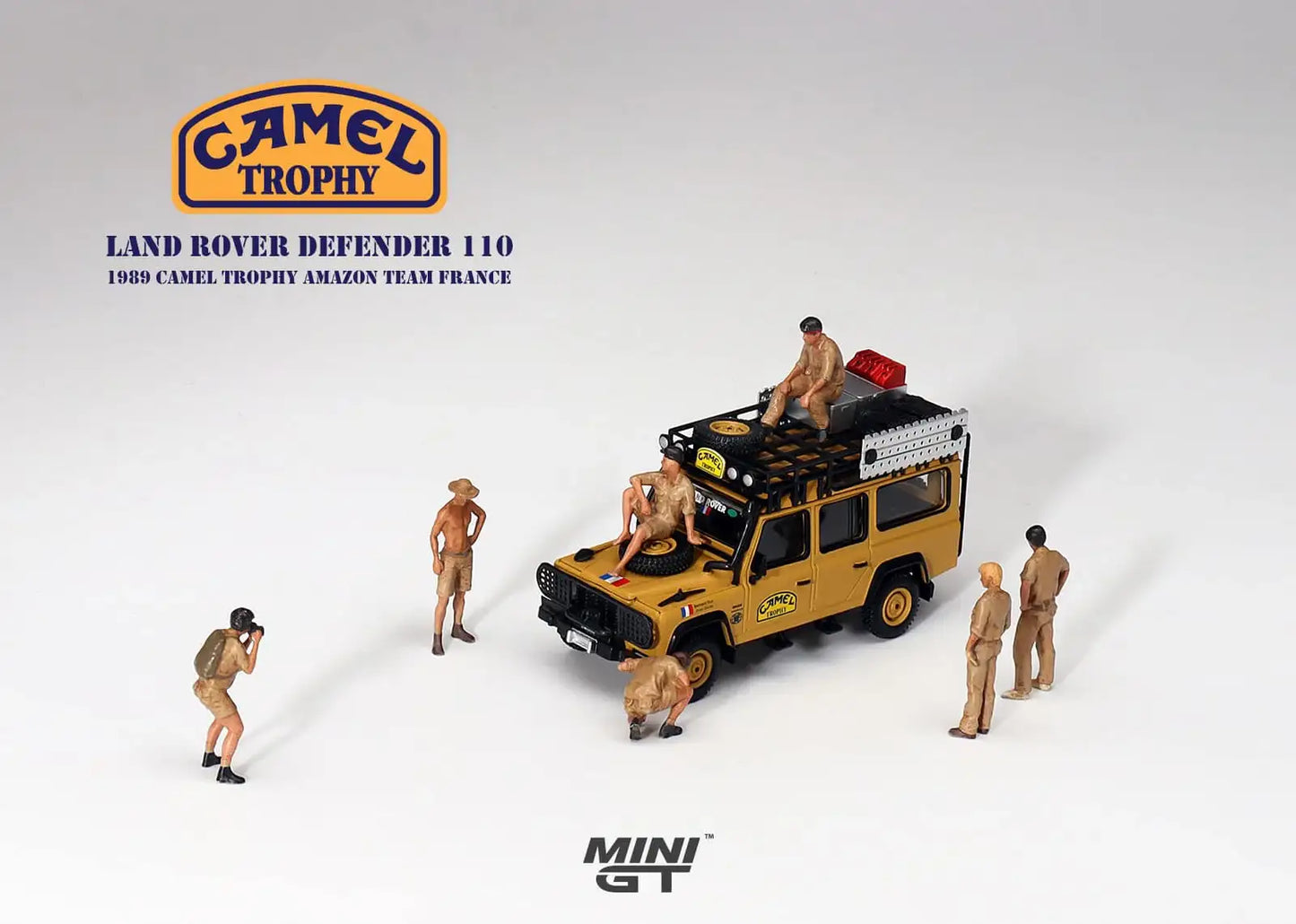 Mini GT MINI GT #463 1/64 Land Rover Defender 110 1989 Camel Trophy Amazon Team France Land Rover Defender 110 WITH #AC17 Camel Trophy crew