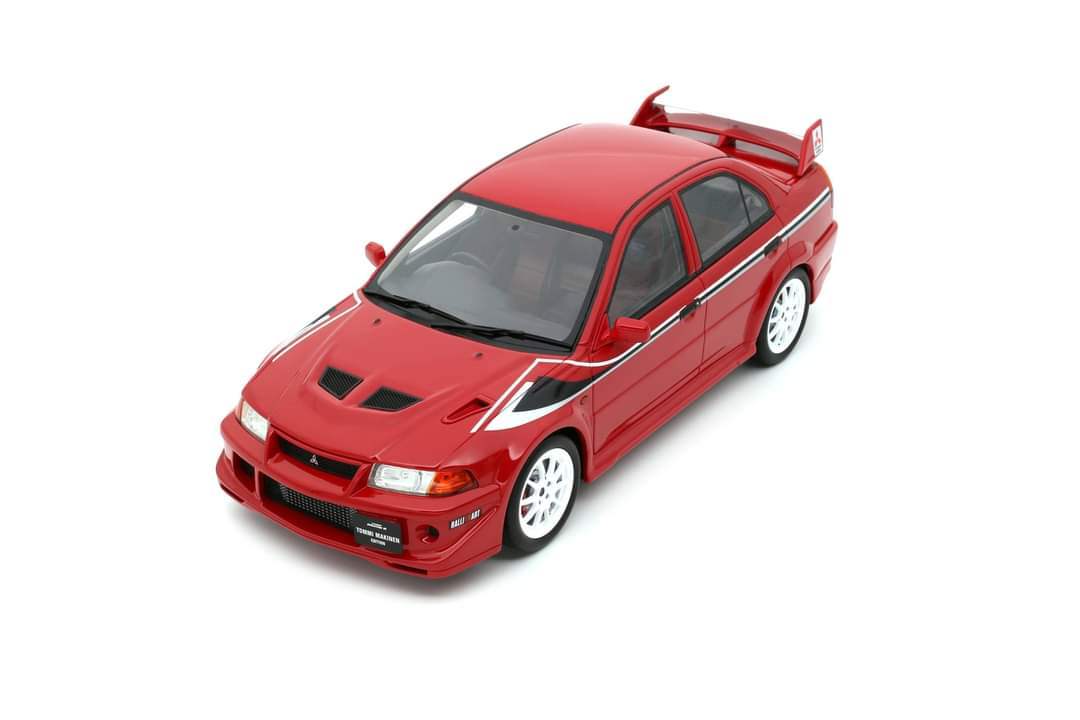 Mitsubishi Lancer Evolution VI model by OTTO Mobile in a showroom setting.