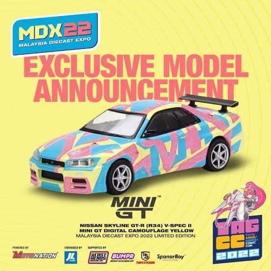 Mini GT MINI GT #447 Nissan Skyline GT-R (R34) V-Spec II Digital Camouflage Yellow MDX22 exclusive