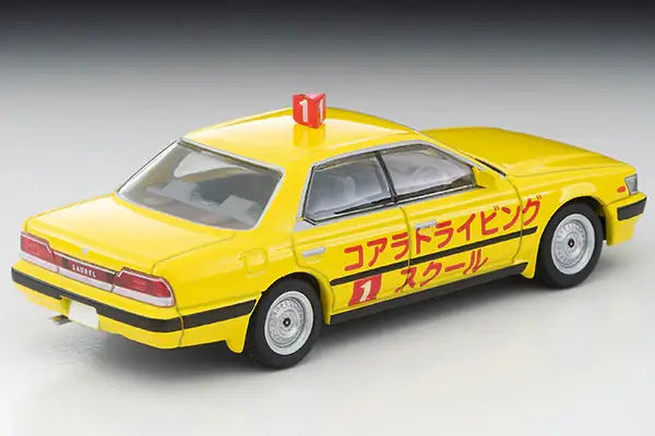 Tomica Limited Vintage Neo LV-N260a Nissan Laurel Training Car (Yellow) 1992