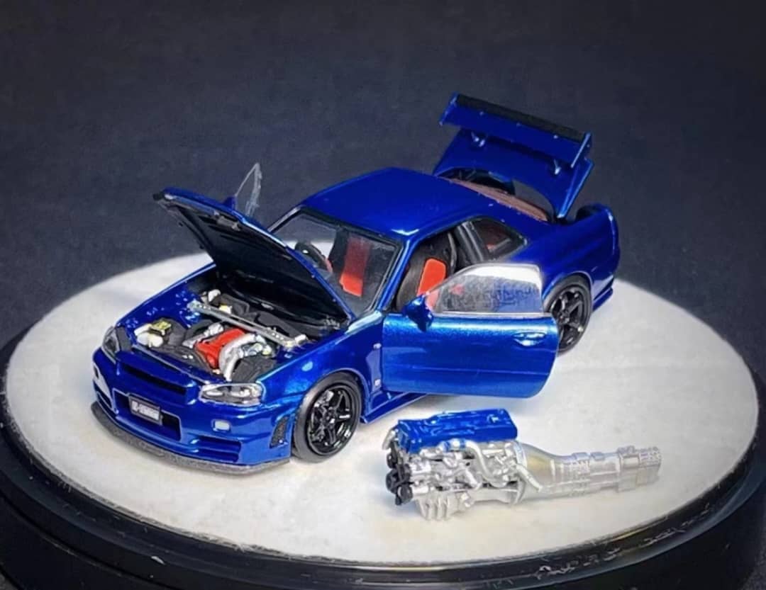 PGM X One Model 1:64 Scale Nissan Skyline GTR R34 Nismo Z Tune Metallic Blue