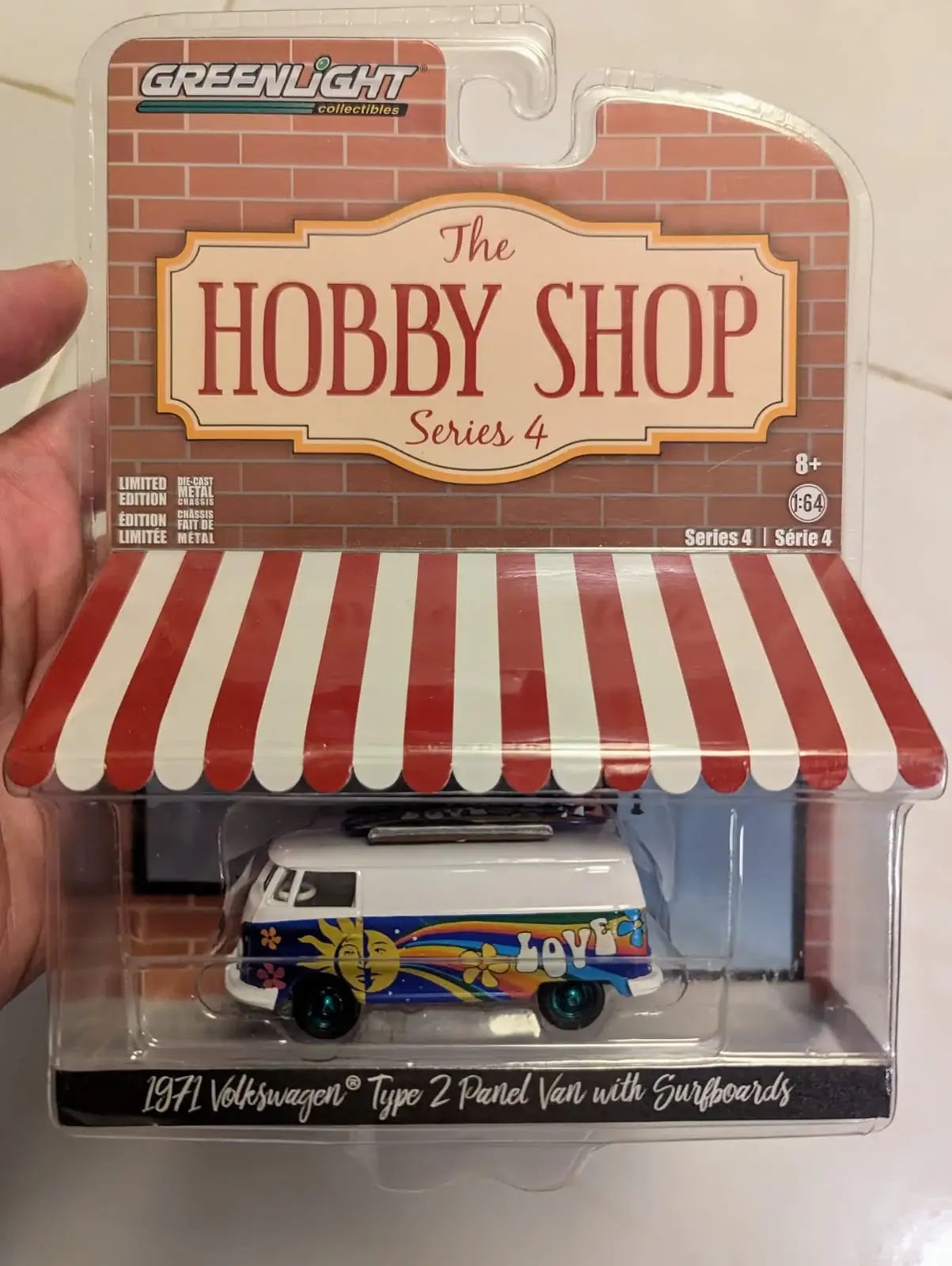 Greenlight 1:64 Scale 1971 Volkswagen Type 2 Panel Van with Surfboards - The Hobby Shop Series 4 Green Machine
