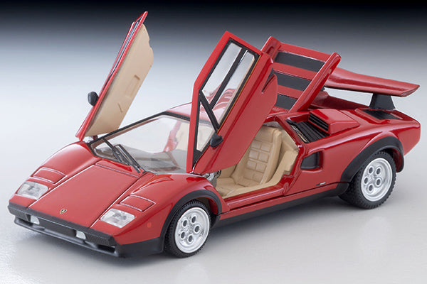 Red Lamborghini Countach LP500S model with scissor doors and rear engine cover open