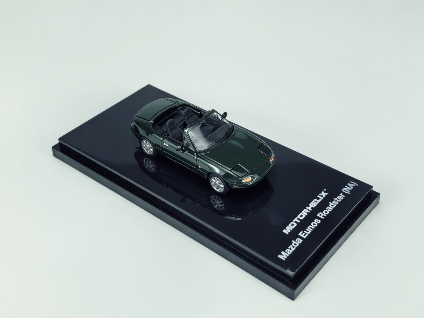 Motorhelix 1/64 Mazda Eunos Roadster NA RHD Dark Green - top view open