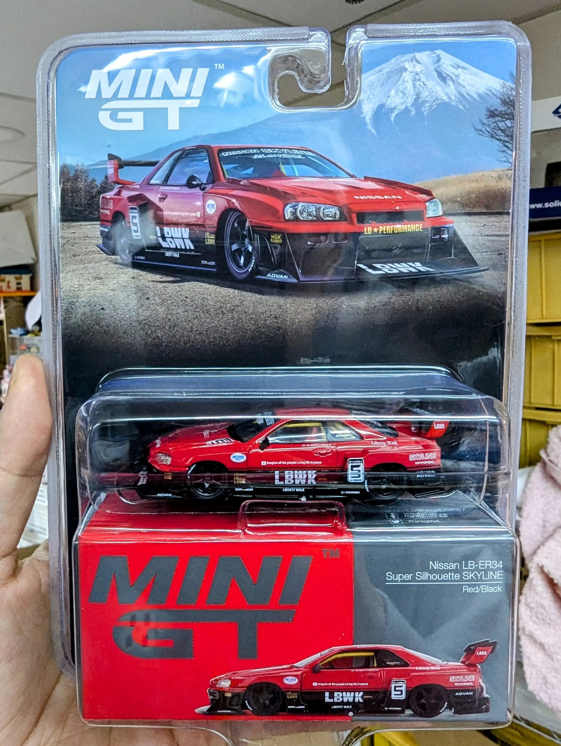MINI GT x Mijo #843 Nissan LB-ER34 Super Silhouette SKYLINE Red 