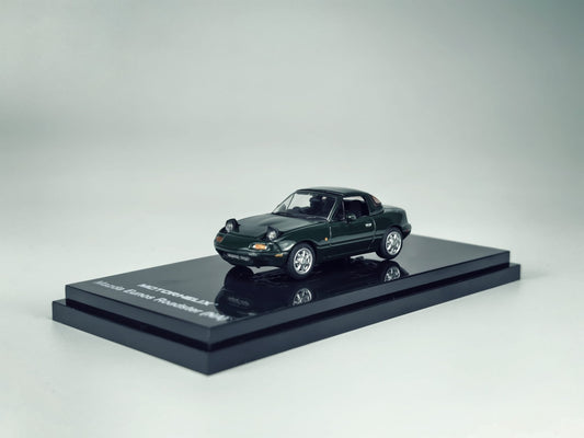 Motorhelix 1/64 Mazda Eunos Roadster NA RHD Dark Green - soft top closed