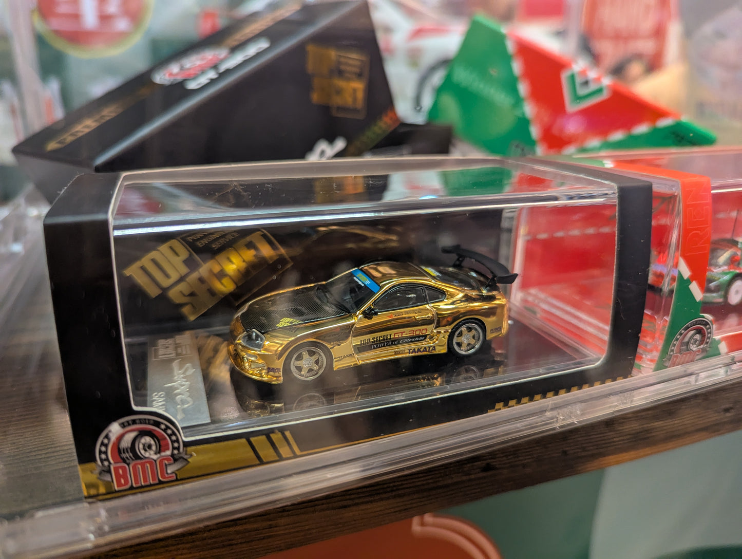 BMC 1:64 Top Secret GT-300 Toyota Supra JZA80 Chrome Gold