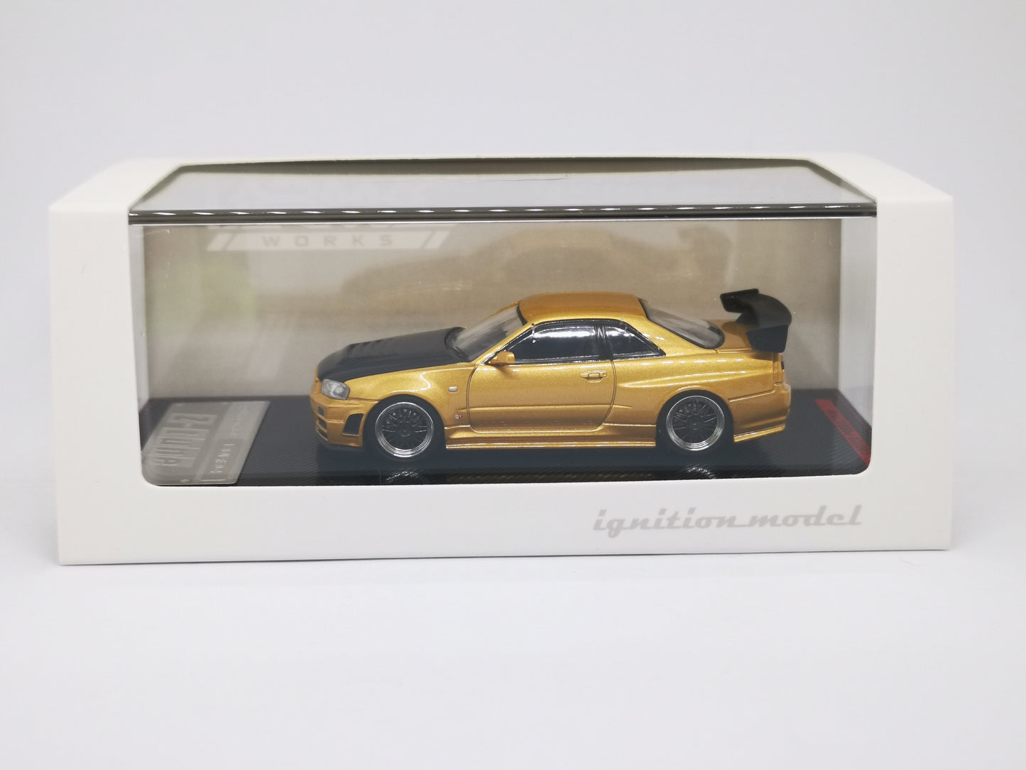 ignition model 1:64 Nissan R34 GT-R Z-tune (Gold)