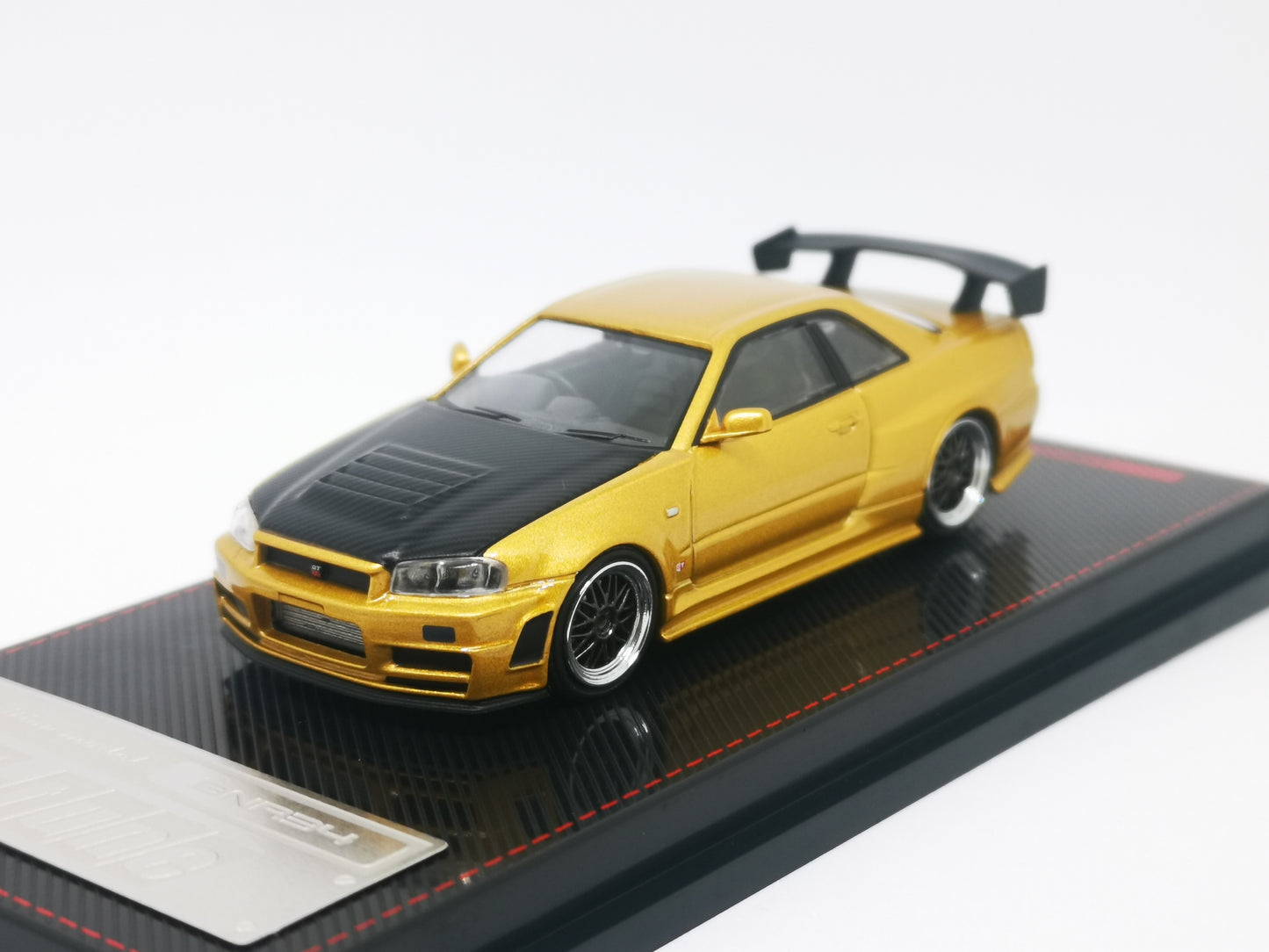 ignition model 1:64 Nissan R34 GT-R Z-tune (Gold)