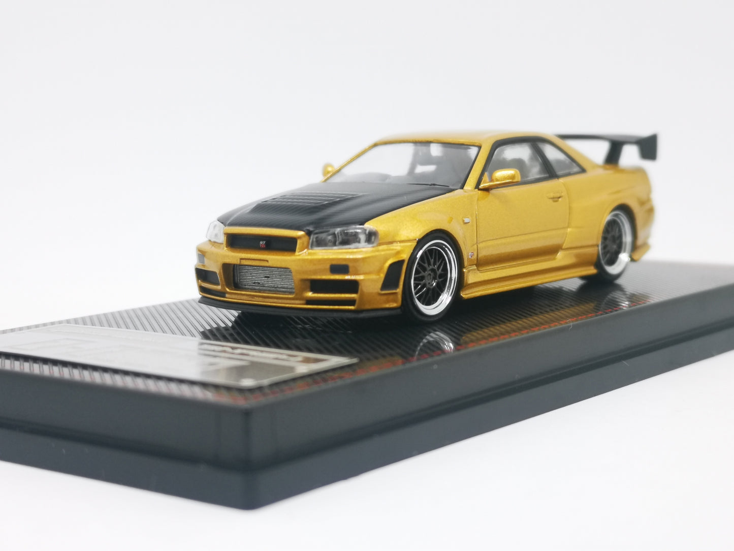 ignition model 1:64 Nissan R34 GT-R Z-tune (Gold)