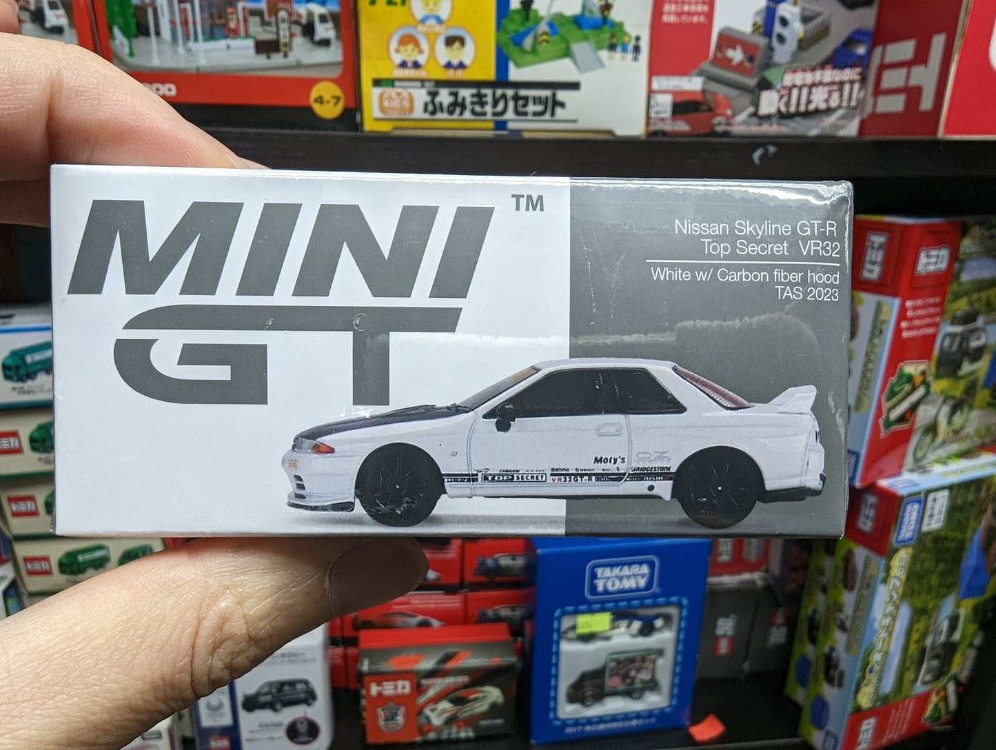 Mini GT #483 Top Secret Nissan Skyline GT-R VR32 White w/ carbon fibre hood Tokyo Auto Salon 2023 Exclusive